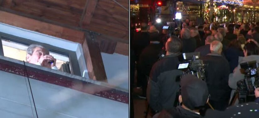 Βerishën nuk e ndal αrresti në shtëρi, del dhe mban fjαΙim me mikrofon nga dritarja e banesës së tij